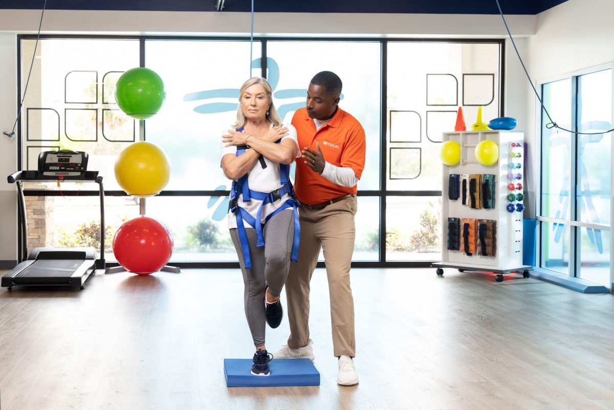 woman having treatment for balance therapy at FYZICAL Chicago